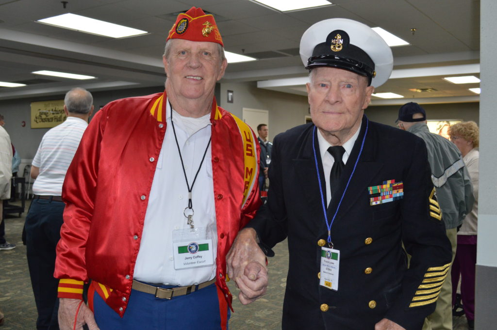 Volunteer Escort Jerry Coffey, left, and US Navy World War II veteran Frank Lowe pose for a photo before their HonorAir Knoxville flight on Wednesday, April 13th.