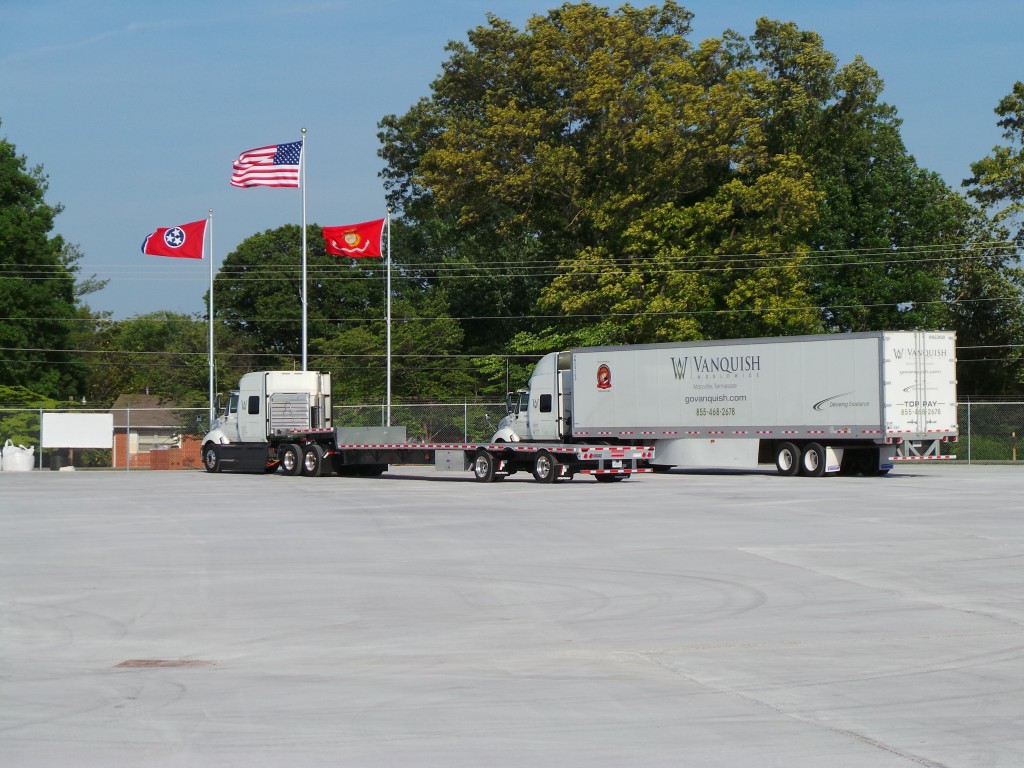 Just a few of Vanquish's trucks with flags flying high.